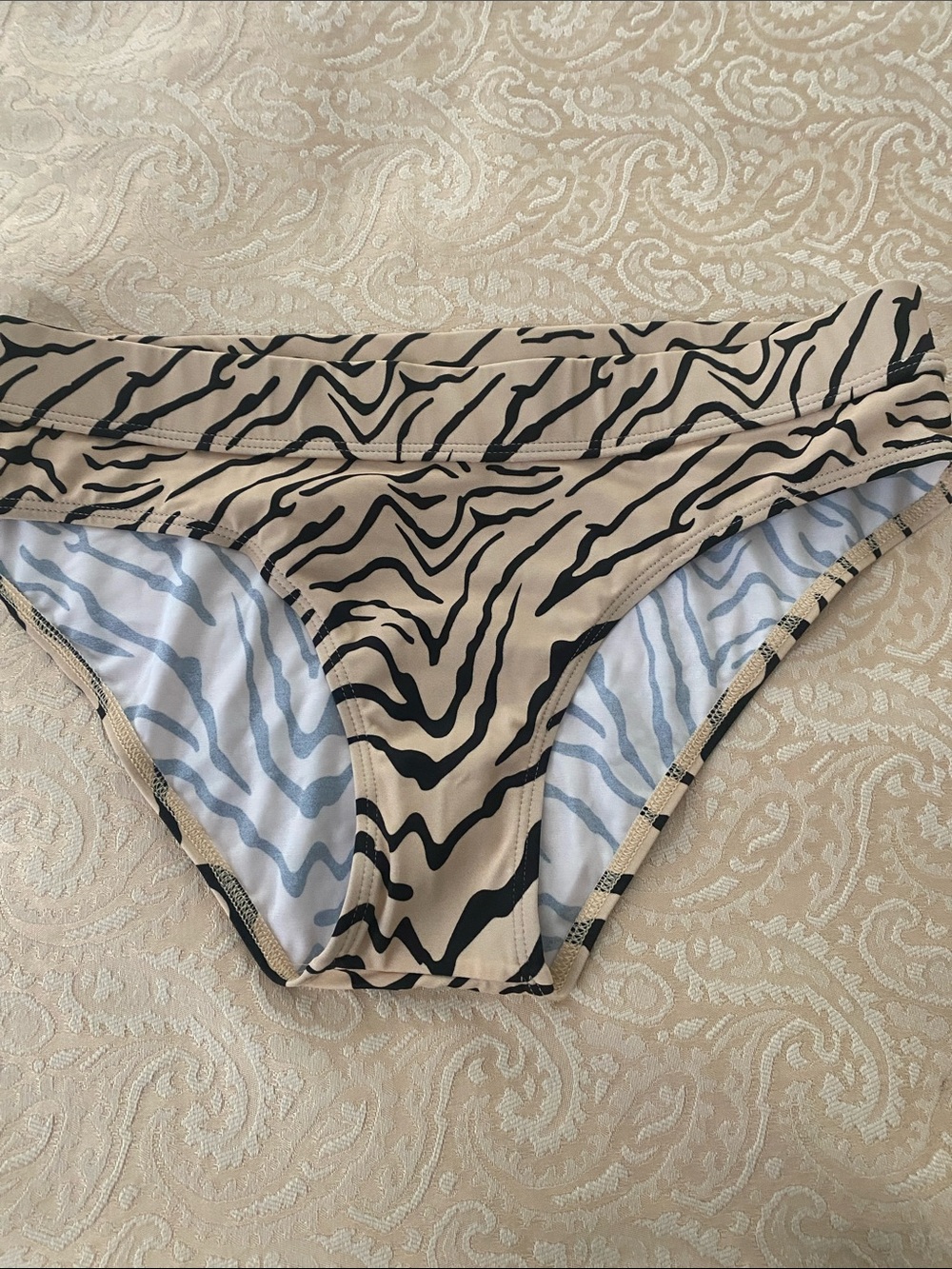NWOT never worn Animal Print Bikini Bottoms in Tan and Black